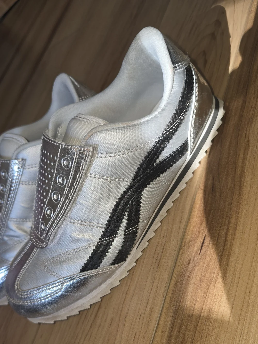 Silver Metallic Slip-On Girls Sneakers with Black Accent